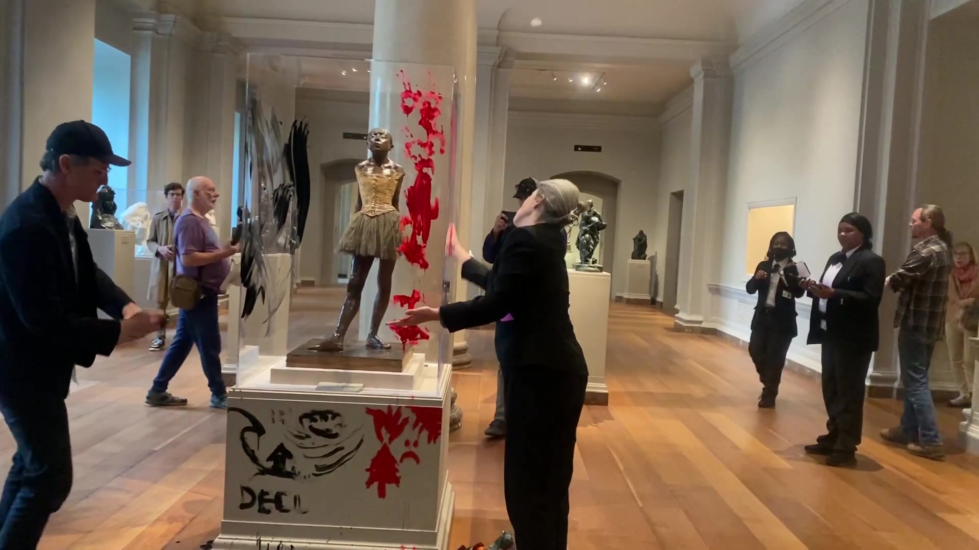 Climate protesters smear paint on sculpture at National Gallery of Art